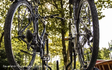 A car with a rack for bicycles
